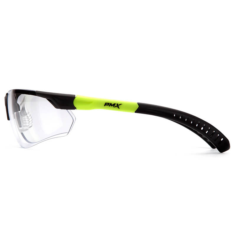Side view of Pyramex Sitecore Safety Glasses SGL101_0DTM with clear lenses, black/neon yellow frame, curved perforated black temple arm, angular lens shape, anti-fog coating, and "Pyramex Safety" branding on the side.