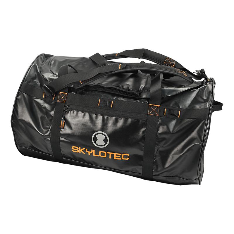 The Skylotec Dufflebag ACS-017_ offers a sleek design with a shiny, water-resistant tarpaulin finish in black, accented by an orange Skylotec logo. It features a side zipper pocket along with durable black handles and straps, making it ideal for carrying climbing or outdoor sports gear.