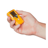 A hand holds a WatchGas SST1 Serviceable CH4S Gas Detector SST1-MM, a compact yellow device with a display screen and solid polymer sensor by WatchGas.