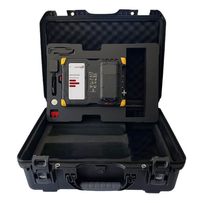 An open black hard case from WatchGas reveals custom foam inserts holding the WatchGas Docking Station SST-DOCK-KIT for gas detection calibration, featuring a display, buttons, accessory compartments, secure latches, and a sturdy handle.
