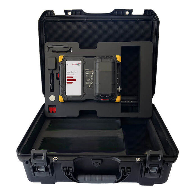 An open black hard case from WatchGas reveals custom foam inserts holding the WatchGas Docking Station SST-DOCK-KIT for gas detection calibration, featuring a display, buttons, accessory compartments, secure latches, and a sturdy handle.