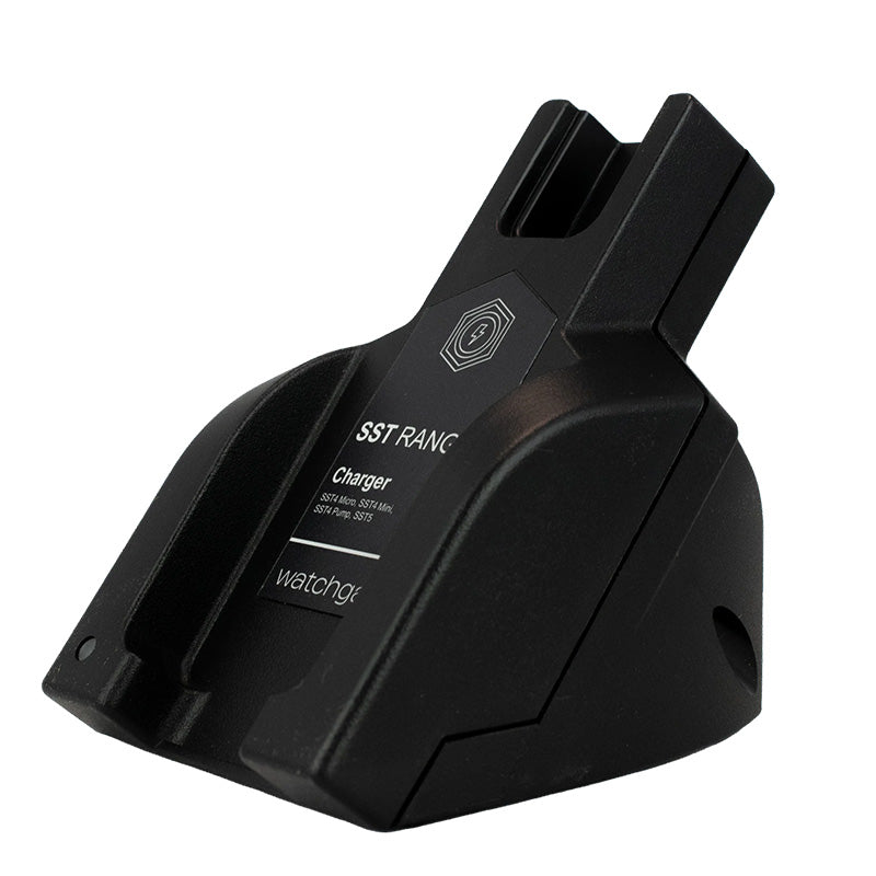 A black WatchGas Induction Cradle Charger - Single Desktop w/Adapter, designed for charging SST4 and SST5 detectors, serves as an industrial desktop device charger compatible with security or tracking systems.