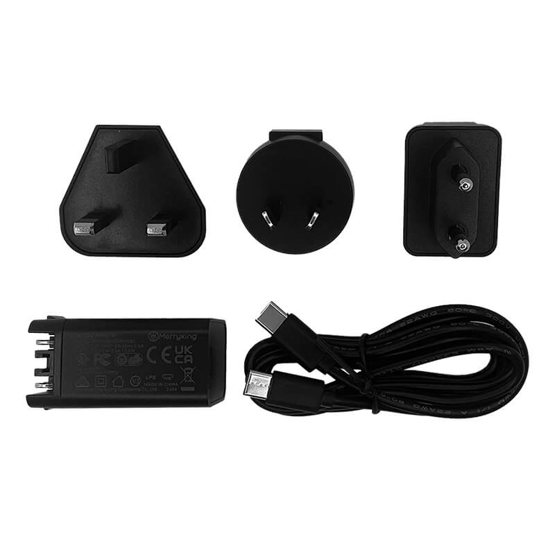 The WatchGas SST4-PUMP Sampling & Charging Kit (SST4-PUMP-ACC) includes a black charger, USB-C cable, and three interchangeable global power adapters for UK, EU, and US outlets—all displayed on a white background—and is the perfect companion for your WatchGas SST4-PUMP accessories kit.