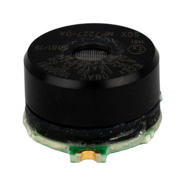 A close-up of a black piezoelectric buzzer with visible markings and a gold connector on a green circuit board, part of the WatchGas SST4-MICRO Replacement LPC LEL Sensor SST-X1-RPL by WatchGas.