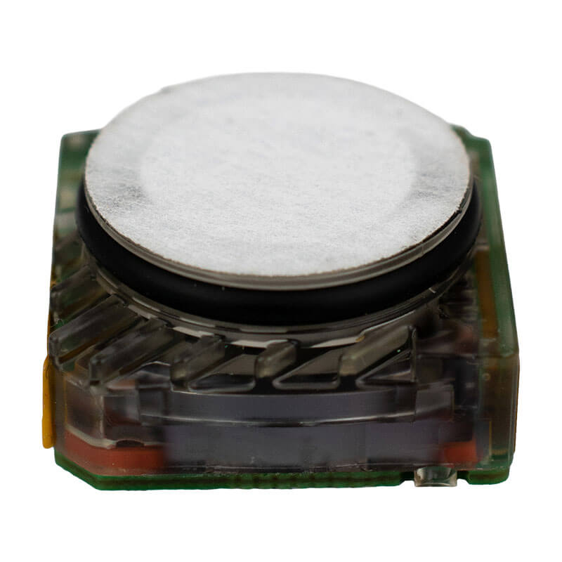 Close-up of the WatchGas SST4-MINI & SST4-PUMP NDIR LEL Sensor SST-X3-RPL, a compact electronic component with a circular metallic top and transparent casing revealing its internal circuitry, ideal for advanced gas detectors, shown on a white background.