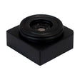 A small, square black plastic object with a round, raised center featuring metallic mesh—it's a WatchGas SST4-PUMP Replacement LPC LEL Sensor (SST-X4-RPL), used in WatchGas gas detectors.