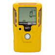 A yellow handheld WatchGas SST1E Serviceable CO Gas Detector (MINI) SST1E-M features a digital display reading "0 ppm," labeled with "watchgas" and "SST1," and has a circular button below the screen. This industrial detector from WatchGas delivers reliable, real-time carbon monoxide monitoring for enhanced workplace safety.