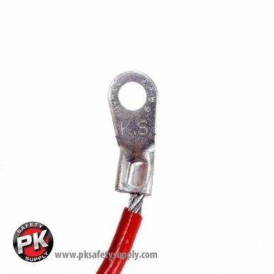 Close-up image of a metal lug terminal attached to a red insulated wire, similar in design to the sturdy Stewart R. Browne Retract-a-Clamp RAC. The lug includes a fastening hole and features the letters "K S" engraved on it. The bottom left corner displays the PK Safety Supply logo and website URL.