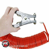 A hand holds a Stewart R. Browne Retract-a-Clamp RAC over a coiled red static grounding cable, its robust design ensuring safety and efficiency. The PK Safety Supply logo is prominently displayed in the corner.