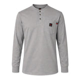 The ForgeFR Forge FR Henley MFRHNLY-004 is a light gray, flame resistant, long-sleeve henley with three collar buttons, ribbed cuffs, and a left chest pocket featuring a black and red logo patch—perfect for comfortable protection.