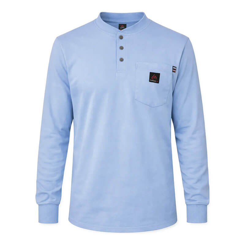 The ForgeFR Forge FR Henley MFRHNLY-004 is a light blue, arc rated Henley shirt with four buttons, a chest pocket with a black logo patch, and ribbed cuffs, shown on a white background—ideal for comfortable flame resistant wear.