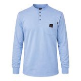 The ForgeFR Forge FR Henley MFRHNLY-004 is a light blue, arc rated Henley shirt with four buttons, a chest pocket with a black logo patch, and ribbed cuffs, shown on a white background—ideal for comfortable flame resistant wear.