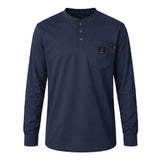 The ForgeFR Forge FR Henley MFRHNLY-004 is a navy blue, flame-resistant long-sleeve shirt with three collar buttons, a chest pocket with logo patch, ribbed cuffs, and straight hem for added protection and style.