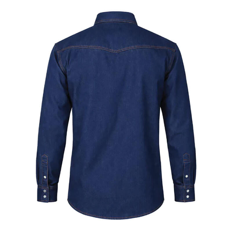 The ForgeFR Forge FR Solid Shirt Denim MFRSLD-002 displays a rear view with its long sleeves, navy blue hue, buttoned cuffs, and a curved hem. Designed with a yoke across the shoulders, this shirt is perfect for those looking for durable flame-resistant workwear.