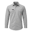 The ForgeFR Solid Shirt MFRSLD-002 is a light gray, long-sleeve flame resistant shirt with two chest pockets, buttoned flaps, and a "FORGE" logo patch above the left pocket—made for dependable FR workwear performance.
