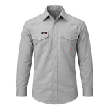 The ForgeFR Solid Shirt MFRSLD-002 is a light gray, long-sleeve flame resistant shirt with two chest pockets, buttoned flaps, and a "FORGE" logo patch above the left pocket—made for dependable FR workwear performance.