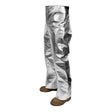 The NSA CARBON ARMOUR SILVERS 19 oz. Aluminized Pants T45NL_ _X32 are silver pants crafted by NSA for protective use in high-heat environments. Made from a heat-resistant material, these flame-resistant pants feature a design devoid of visible waistband or fastenings, complemented by brown boot-like footwear at the bottom to enhance practicality.