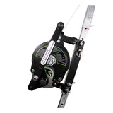 A close-up of the Frontline Patriot 50' 3-Way Retrieval & SRL RAG503W-US by Frontline Fall Protection, a manual cable winch with a hand crank and instructional labels, attached to a metal ladder for lifting or lowering objects.