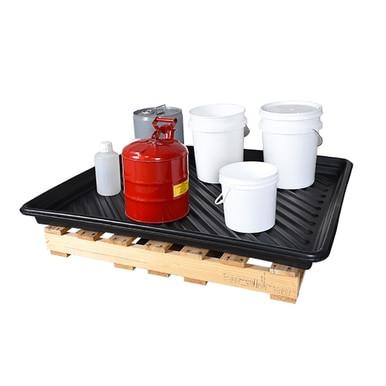 An UltraTech Utility Tray 103, manufactured by UltraTech International, is a black spill containment pallet made from heavy-duty polyethylene. It can hold various containers such as a red metal can, white plastic buckets, and a gray canister while positioned on a wooden pallet to ensure optimal storage safety.