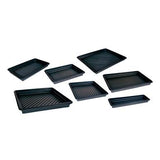 A set of seven UltraTech International Utility Trays, model 103_, made from durable polyethylene and designed with a ribbed surface for effective spill management, is neatly displayed on a white background.