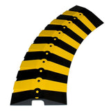 The UltraTech Sidewinder System with Endcaps 18_0, by UltraTech International, features a curved row of modular black and yellow segments arranged in an alternating striped pattern. Each segment includes holes for ground mounting, mirroring the adaptable design similar to Sidewinder Cable Protection.