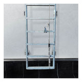 The Frontline Cable Vertical Lifeline System VLCS by Frontline Fall Protection runs down the center of this five-rung metal ladder, ensuring essential fixed ladder safety against a white wall above a black surface.
