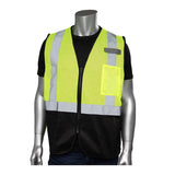 A silver mannequin showcases a construction safety ensemble, featuring the PIP Type R Class 2 Three Pocket Mesh Vest with a black bottom front in high-visibility yellow and reflective tape over a black shirt and blue jeans. This vest by PIP - Protective Industrial Products includes a zipper front and a small pocket on the left side, ensuring optimal visibility on any site.