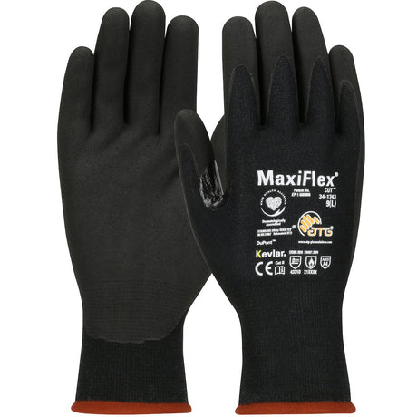 A pair of PIP MaxiFlex Cut Seamless Knit DuPont Kevlar gloves in black with printed text and logos on the back. These touchscreen-compatible gloves feature an orange trim at the wrist and are shown with one palm facing up and one palm facing down, highlighting brand details and cut protection information.