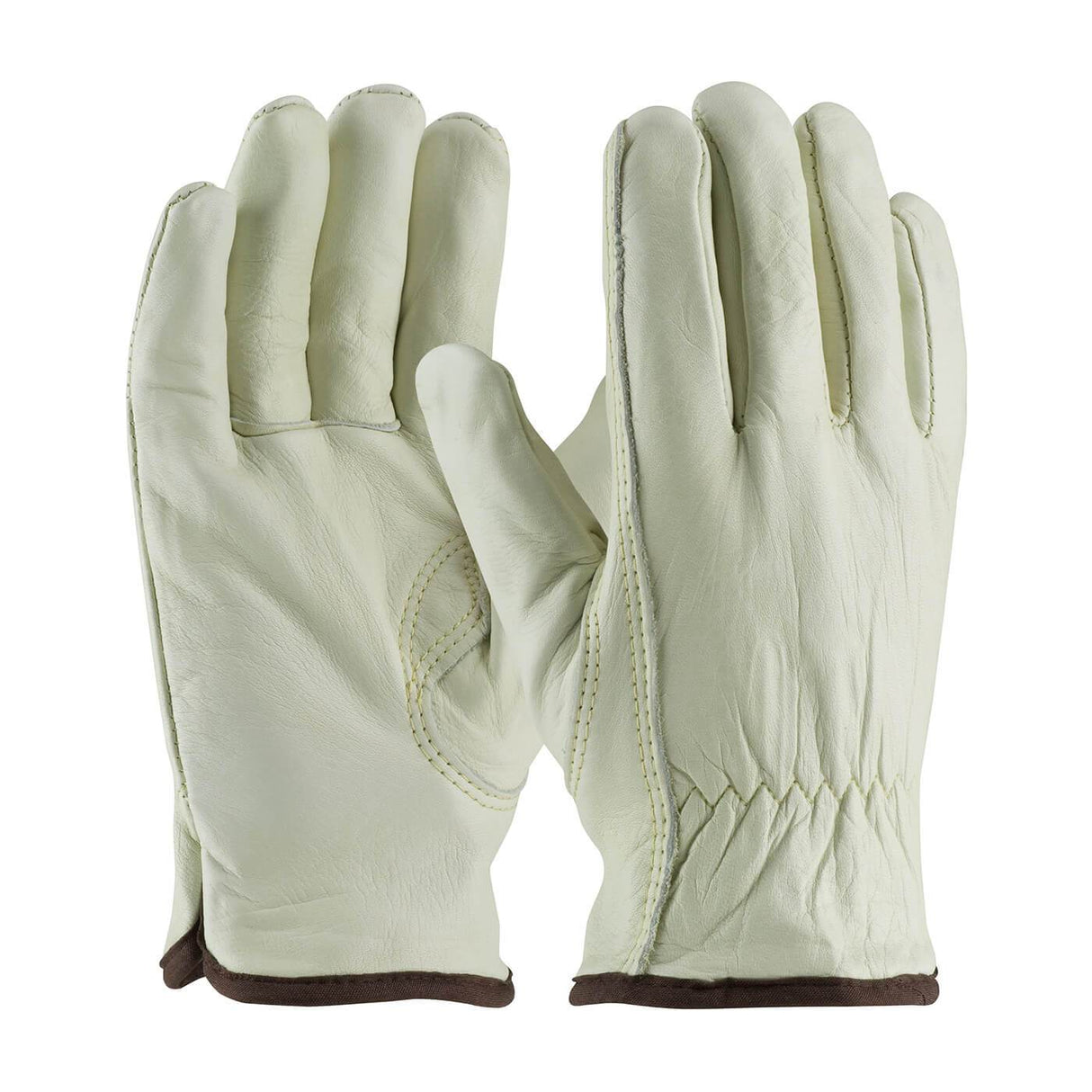 A pair of PIP Economy Top Grain Cowhide Leather Drivers Gloves in light beige, with distinctive brown trim at the wrist, are elegantly showcased on a white background. These gloves feature a keystone thumb design, with one glove displayed palm up and the other palm down.