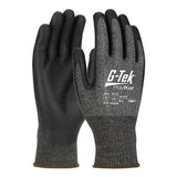 Close-up of the black and gray PIP G-Tek PolyKor X7 16-377 gloves, featuring high cut resistance and a textured surface for excellent grip. These cut-resistant gloves also have specifications printed on the back, ensuring both safety and touchscreen compatibility.