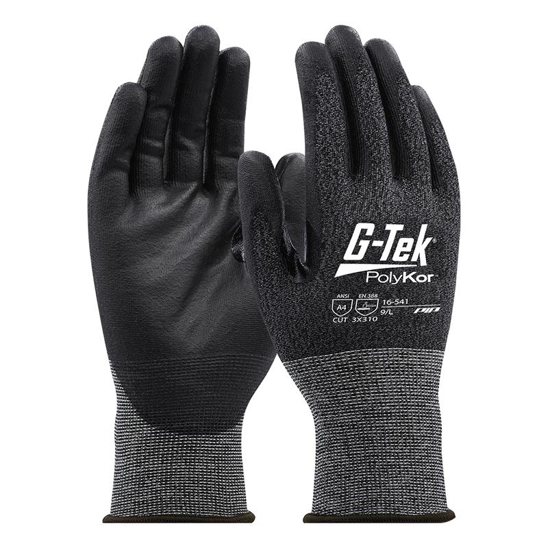 A pair of PIP G-Tek PolyKor Blended Touchscreen Gloves, model 16-541, featuring black textured palms and fingers. These gloves showcase a speckled gray design on the back and wrists, emphasizing their cut resistance. The size information is clearly indicated on the gloves, making these polyurethane-coated gloves from PIP - Protective Industrial Products suitable for a variety of tasks.