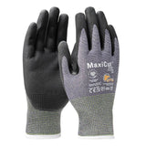 A pair of PIP MaxiCut Ultra Nitrile MicroFoam A4 Gloves 44-4745D in grey and black offers a textured grip surface and advanced Nitrile MicroFoam technology for enhanced durability. These gloves provide touchscreen compatibility, and the safety standards and specifications for cut protection are displayed on the back of the right glove.