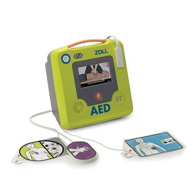 The ZOLL AED 3 Defibrillator Package 8511-00110_-01 is a portable device with attached electrode pads featuring illustrated placement guides and a display showing Real CPR Help instructions.