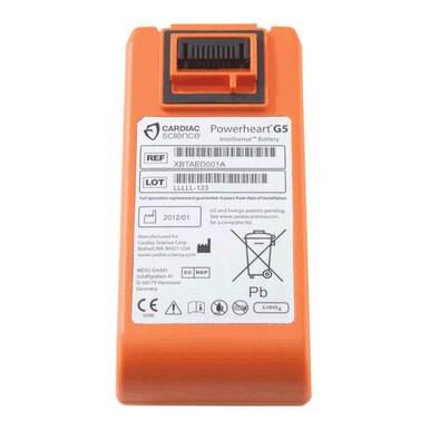 The ZOLL Powerheart G5 AED Defibrillator Package (G5_-80C-S) features barcode, product labels, recycling, and safety symbols clearly visible on the front.