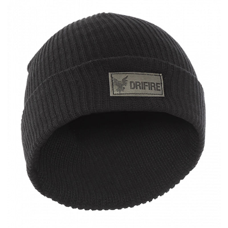 The NSA FR Monacrylic Knit Winter Hat HMOD2BK is a black knitted beanie with a folded brim, crafted as flame-resistant winter wear. It includes a gray patch displaying the logo and the word "NSA," seamlessly blending style and safety.