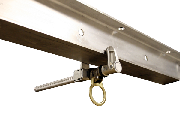 The French Creek Production Sliding Beam Anchor with Floating D-Ring 1702 is a metal I-beam equipped with a safety lanyard attachment point, making it ideal for fall protection. This industrial device features a lever and ring mechanism for secure fastening and functions as a sliding beam anchor, presented against a plain background to emphasize its robust design.