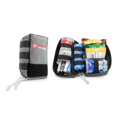 The ZOLL Mobilize Compact Rescue System 8911-003000-01 is showcased, featuring MOLLE straps. It is partially open, displaying lifesaving supplies like bandages and gloves stored in organized pouches. The exterior is gray with a red and white cross logo for quick emergency access.