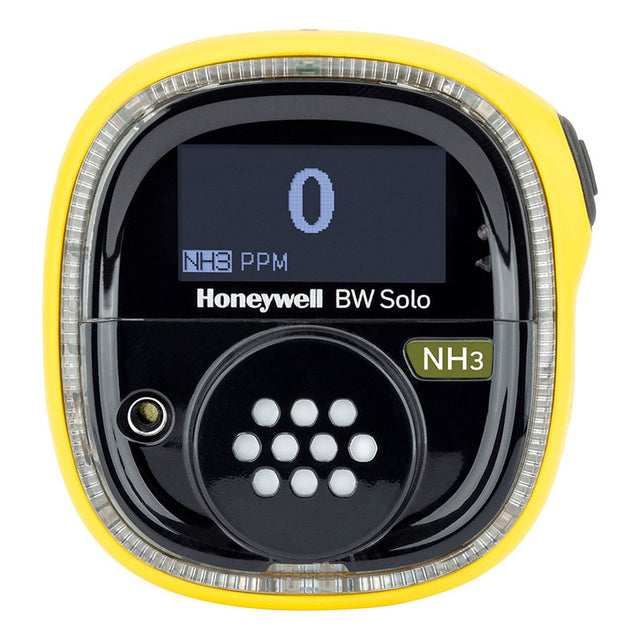 The BW Honeywell BW Solo Wireless Gas Detector NH3 ext range BWS1-A2-Y displays "NH3" and "0 PPM" in blue text on its digital screen. The device is predominantly black with a yellow border and features small round sensors, specifically designed for an extended ammonia range, ensuring reliable safety monitoring.