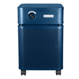 The Austin Air Systems Bedroom Machine B402 is a blue rectangular air purifier with a medical grade HEPA filter, a top-front control knob, "Bedroom Machine" label, and four small wheels.