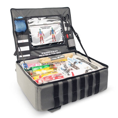 The ZOLL Mobilize Mobile Rescue System 8911-002000-01, designed in sleek black and gray, opens to reveal an assortment of medical supplies such as bandages, scissors, gloves, and tubes. Inside the lid are organized compartments and a pocket containing instructional cards—ideal for efficient emergency response.