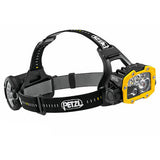 Introducing the Petzl DUO RL Rechargeable Headlamp E103AA00, a stunning black and yellow creation from Petzl featuring adjustable straps. This marvel is equipped with REACTIVE LIGHTING® technology and provides multiple light settings, reaching up to 3000 lumens. Its sturdy strap proudly displays the bold brand logo.