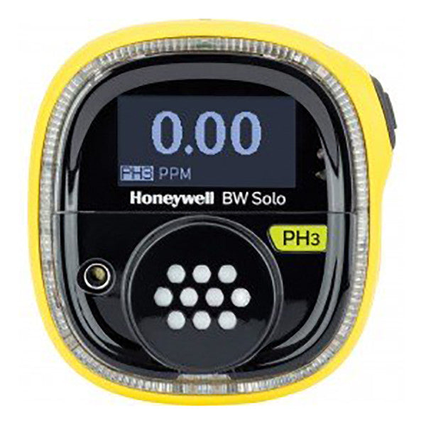 The image showcases a BW Honeywell BW Solo Wireless Gas Detector PH3 BWS1-P-Y, featuring a vibrant yellow casing. The display shows "0.00 PPM," indicating no detection of phosphine gas. Below the display is a button marked "PH3," and the device includes a circular grid of vents. It is compatible with Honeywell Safety Suite.