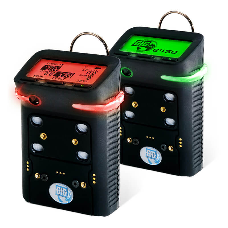 Two GfG MSHA G450 4 Gas Detectors (Rechargeable) with digital displays—one with a red screen and the other green. Both devices feature black casings, buttons, “GfG” labels, and LED indicators encircling the top edge. These MSHA-approved gas detectors are ideal for confined space detection.