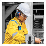A worker equipped with a white helmet, safety glasses, ear protection, and a yellow protective suit operates industrial equipment indoors while using the GfG G222E Micro 5 H2S Single Gas Detector (model G222E-0200) from GfG.