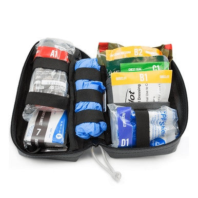 The ZOLL Mobilize Compact Rescue System 8911-003000-01 is a compact rescue system featuring a first aid kit with various labeled compartments, containing lifesaving supplies such as bandages and medical items, all organized neatly in a zippered black case.