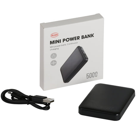 A black mini power bank with a USB charging cable, next to its white packaging box labeled "Mini Power Bank" and "5000," offers the perfect on-the-go convenience. It's an ideal companion to the PIP Boss Therm Heated Baselayer Vest 300-HV100 by Protective Industrial Products, which provides warmth with flexible heating panels.