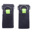 The PIP - Protective Industrial Products Wristband Tool Holder 533-300401 is equipped with two black fabric straps featuring Velcro and green stitching, complemented by metal D-rings for a secure fastening. When arranged flat side by side on a white background, the design highlights its sleek utility.