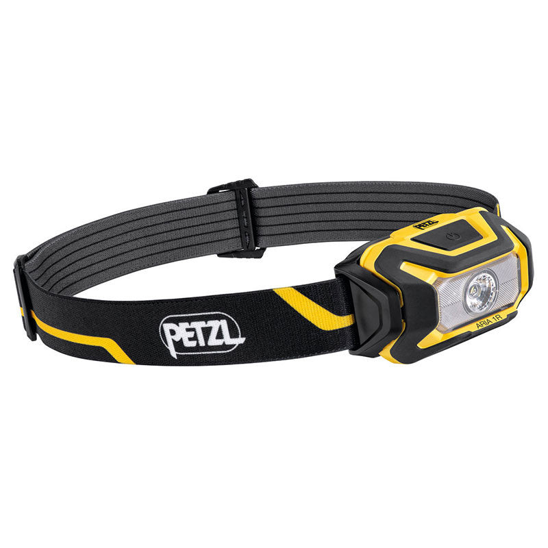 The Petzl ARIA 1R Rechargeable Headlamp E069CA00 is a black and yellow headlamp with an adjustable strap, boasting a central light bulb and sleek design. This durable, waterproof headlamp is perfect for outdoor activities, providing reliable performance in various conditions.