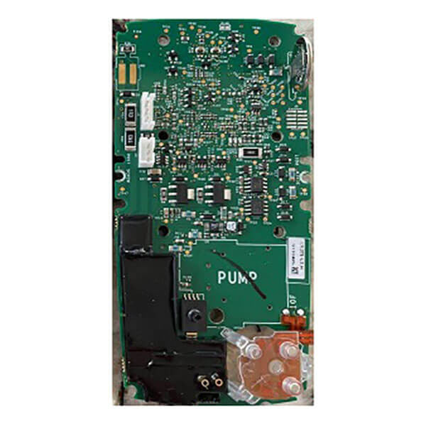 The BW Replacement Main PCB with Screws for Max XT II, bearing the label "XT-MPCB2" from the renowned brand BW Honeywell, showcases a green printed circuit board adorned with a variety of electronic components such as chips, resistors, and capacitors. The design features a combination of green and black regions along with some transparent sections.