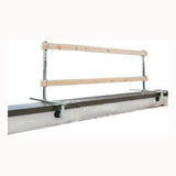 The French Creek Portable Guardrail System GR200 from French Creek Production combines metal and wooden elements, mounted on a steel beam. This system includes two parallel wooden bars secured to metal posts for effective fall prevention and safety along the beam. Perfect for various parapet installations, it offers an ideal mix of durability and practicality.